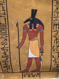 an ancient egyptian painting on display in a museum