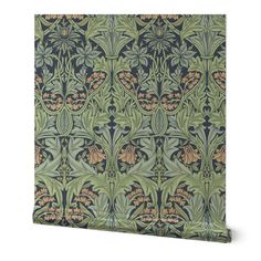 an intricately designed wallpaper with flowers and leaves in blue, green and orange