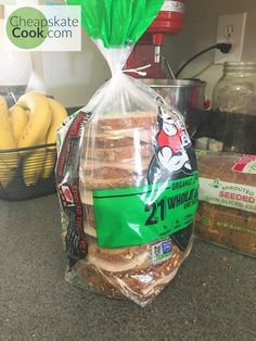 a bag of bread sitting on top of a counter