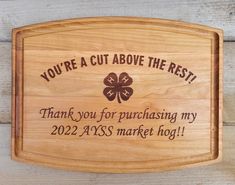 a cutting board with the words you're a cut above the rest thank you for purchasing my 202 asss market hog