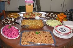 a table filled with lots of food on top of it