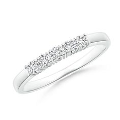 a white gold ring with five diamonds