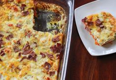 a casserole dish with bacon and cheese on it next to a white plate