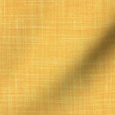 an orange and yellow textured fabric with white lines on the top right half of it