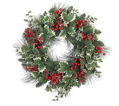 a christmas wreath with holly, berries and pine cones