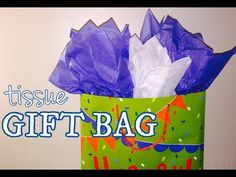 a gift bag with tissue paper in it and the words tissue gift bag written on it