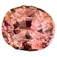 an oval shaped pink diamond on a white background