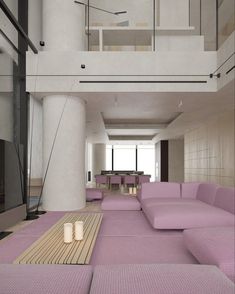 a living room filled with lots of purple furniture