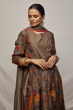 Grey cotton silk floral print kurta with French knot yoke. Paired with striped pant and dupatta.
Components:3
Pattern:Embroidered, Printed
Type of Work:Thread work, Mirror work, Floral
Neckline:Mandarin collar
Sleeve Length:Three quarter
Fabric:Cotton silk
Color:Grey
Other Details:
Coin tassel detail
Lace work cuffs
Tassel dupatta
Occasion:Sangeet - Aza Fashions Tassel Dupatta, Kurta Set For Women, Striped Pant, French Knot, Fashion App, Mirror Work, Thread Work, Kurta Set, Embroidered Silk