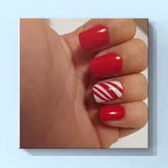 Short Square Red Nails With Candy Cane Striped Accent Nail. Set Of 12. Would Be Really Cute For Christmas If You Like The Design But Need Another Size Or Want A Different Length/Shape Let Me Know And I Can Custom Make Them Christmas Nails Nail Polish, Candy Cane On Nails, Christmas Nails With Candy Canes, Short Basic Christmas Nails, Red Green And Gold Nails Christmas, Red And White Striped Nails, Red And White Candy Cane Nails, Easy Candy Cane Nails, Candy Cane Toes Nails