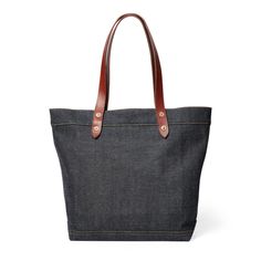 Made with true indigo-dyed Japanese denim. Riveted vegetable-tanned leather handles with a “RRL”-debossed suede patch. Jean-style patch pocket at the front with signature double-needle decorative stitching. Classic Denim Bag For Everyday Use, Fall Entertaining, Women's Shoes Accessories, Decorative Stitching, Denim Tote, Japanese Denim, Indigo Dye, Leather Handles, Leather Patches