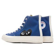 The iconic partnership of Converse and Comme Des Garçons PLAY is highlighted in their All Star Chuck ‘70 High sneaker model. The model features the iconic red heart logo designed by artist Filip Pagowski as well as a signature canvas upper and lace-up closure. Complete with a rubber toebox and outsole, the sneaker provides a long-lasting finish. CHUCK TAYLORS RUN ABOUT 1/2 SIZE LARGE, WE RECOMMEND SIZING DOWN. THIS PRODUCT DOES NOT QUALIFY FOR ANY DISCOUNTS OR SPECIAL PROMOTIONS. 12 oz cotton ca Filip Pagowski, Converse X Comme Des Garcons, 2024 Wishlist, Quince Ideas, Converse Chuck 70, Model Features, High Sneakers, Comme Des Garcons Play, Heart Logo