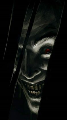 an evil looking man with red eyes and fangs on his face is seen through the darkness