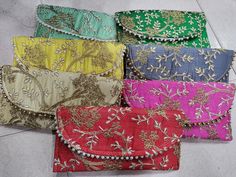 "Wholesale Lot 100 Piece Handmade Women's Embroidered Clutch Potli Bag Wedding Clutch Evening Bag Wedding Favor Return Gift For Guest PRODUCT DETAIL :- -------------------------- Product Item : Hand Clutch Bags Size : 5x9\" inche approx Material -: Fabrics, Beads Occasion: Any Occasion, Festive, Party, Wedding, Bridal PRODUCT DESCRIPTION :- This colorful Clutch Purse with vibrant colors & ethnically designed is a specialty from Rajasthan artisans. India comes to life through rich colors, lavish Multicolor Handwork Bags For Wedding, Multicolor Clutch For Wedding Festivals, Multicolor Clutch For Wedding And Festivals, Multicolor Handwork Wedding Bag, Green Pouch Clutch For Wedding, Traditional Clutch With Gold Embroidery For Wedding, Traditional Wedding Clutch With Gold Embroidery, Wedding Embroidered Brocade Fabric, Multicolor Embroidered Bags For Wedding