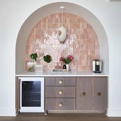 a kitchen with an oven, microwave and counter top in it's center area