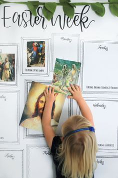 a young child is looking at pictures on a white board with the words easter week