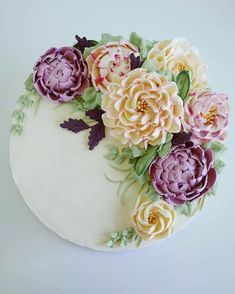 there is a cake decorated with flowers on it