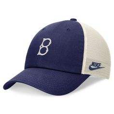 Step out in throwback style with this Brooklyn Dodgers Rewind Club Trucker hat from Nike. It features classic team graphics on the front and an adjustable strap for all-day comfort. The mesh panels keep this Brooklyn Dodgers trucker hat extra cool, while the curved bill provides a street-ready look. Officially licensed Adjustable fabric strap with slide buckle Unstructured relaxed fit Material: 100% Cotton Mid Crown Brand: Nike Wipe clean with a damp cloth Mesh mid and rear panels Imported Solid Collegiate Trucker Hat With Curved Brim For Streetwear, Collegiate Streetwear Trucker Hat With Curved Brim, Collegiate Style Trucker Hat With Curved Brim For Streetwear, Collegiate Style Sports Trucker Hat With Flat Brim, Throwback Baseball Cap For Baseball Season With Curved Brim, Throwback Trucker Hat For Baseball Season, Collegiate Baseball Hat With Curved Brim, Throwback Curved Brim Hats For Baseball Season, Collegiate Adjustable Trucker Hat For Streetwear