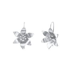 The Magnolia flower earrings are handcrafted in fine silver by one of our hill tribe partners in Thailand. These earrings really pop and will brighten your face and your spirit. Length: 1 1/4" Free shipping over $100, free returns within 30 days. Artisan Flower Earrings With Ear Wire, Leo And Sagittarius, Flower Drop Earrings, Fire Signs, Magnolia Flower, Flower Images, Silver Flowers, Silver Hoop Earrings, Flower Earrings