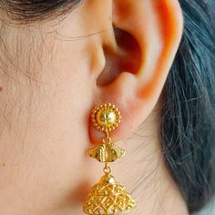 This is a beautiful 22k Real Gold pair of jhumka Earrings .  This is the perfect gift for mom, wife, fiancée, girlfriend, valentine, daughter, family or friend. It is a special gift for mother's day, valentine's day, wedding, anniversary, birthday, Christmas, Easter, New Year's and any holiday. 1. Material Details ✫ Gold : 22K (Real Gold) ✫ Gold Color Options: Yellow Gold ✰ Shape: floral ✰ Color: Yellow ✰ Weight:  10.196 grams approx. Terms & Conditions If there is any change. We request buyer to please inform us before item is shipped. After shipping we cannot accept any changes. Gold Jhumkas With Tilla For Navratri, Gold Chandbali Jhumkas With Latkans, Traditional Gold Jhumkas For Festivals, Ceremonial Jhumkas With Latkans, Gold Temple Jewelry Jhumkas For Navratri, Gold Temple Jewelry Jhumkas With Intricate Design, Gold Cutdana Jhumkas For Festivals, Gold Bollywood Jhumkas With Tilla Details, Traditional Gold Jhumkas With Tilla