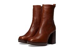 Steve Madden Edson Bootie - Women's Boots : Cognac Leather : Elevate your fall-ready style in the chic Steve Madden Edson Bootie. Inside zipper closure. Square toe silhouette. Pull tab in back for easy on and off access. Stacked platform and block heel. Leather upper. Man-made lining and insole. Man-made outsole. Made in Brazil. Measurements: Heel Height: 3 1 4 in Weight: 1 lb 3 oz Shaft: 8 3 4 in Platform Height: 3 4 in Product measurements were taken using size 8.5, width M. Please note that m Boots Cognac, Steve Madden Boots, Leather Heeled Boots, Shoe Inspo, Fall Fits, Dream Shoes, Looks Vintage, The Chic, Steve Madden Shoes