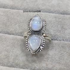 Moonstone is thought to be an emotional healer and will help you discover stability while fostering feelings of power. Moonstone Jewelry helps you maintain emotional equilibrium and gives you self-assurance in any circumstance. Those who struggle with rage issues would feel at ease and peaceful after using moonstone. stone- moonstone  size- all size  available  stone shape- pear setting-  Bezel This is classy fine hand-crafted sturdy moonstone ring. Silver Teardrop Moonstone Ring For Anniversary, Spiritual Teardrop Moonstone Ring, White Teardrop Sterling Silver Rings, Silver Teardrop Moonstone Ring, Sterling Silver Teardrop Moonstone Ring Gift, Adjustable Teardrop Moonstone Ring In Sterling Silver, Elegant Handmade Moonstone Ring For Healing, Silver Spiritual Teardrop Ring, Silver Teardrop Rings With Spiritual Style