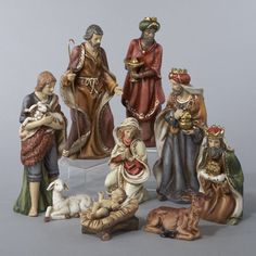 a group of figurines sitting next to each other