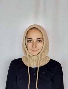 Warm Knitted Women Wool Hood The hood will replace a whole set of accessories for you: a hat, a snood, a scarf, a neck warmer ... that is all in one. It will definitely not ruin your hairstyle and is very comfortable.  In a car or a store, you just take it off your head and wear it like a simple hood. One Size Fits Most Made with high quality yarn: 100% merino wool Soft and light, skin friendly. Possible colors you can see on the last photos of my listing.  Color on photo - 04 beige Colors may a Winter Beige Knit Bonnet, Knitted One-size Hooded Balaclava, Knitted Hooded Bonnet For Cold Weather, Winter Hooded Balaclava, Hooded Winter Balaclava, Winter Knit Fitted Bonnet, Fitted Knit Winter Bonnet, Casual Hand Knitted Hooded Balaclava, Hand Knitted Hooded Balaclava For Winter