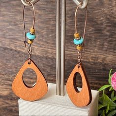 Unique Earrings This Is For 1 Pair Wooden Earrings Rounded Triangular Shape Open Center Long Hanging Boho Chic Long Dangling Earrings Colors: Tan, Turquoise Blue Size: Approximately 2 3/4” From The Top Of The Hoop To Bottom Wooden Earrings Rounded Triangular Open Center Long Hanging Boho Earrings Unique Fun Different Open Center Wooden Hanging Boho Earrings Sift Modern Flair Funky Wood Hanging Parties Vacations Photo Shoots Pictures Out With Friends Brown Pierced Dangle Teardrop Earrings, Earthy Brown Teardrop Jewelry, Bohemian Brown Teardrop Earrings For Pierced Ears, Nickel-free Brown Teardrop Earrings For Jewelry Making, Bohemian Brown Teardrop Earrings, Brown Teardrop Hoop Earrings For Gifting, Brown Teardrop Hoop Earrings As Gift, Brown Teardrop Hoop Earrings For Gift, Unique Brown Teardrop Earrings