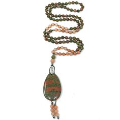 Enjoy this hand-knotted mala necklace made with natural unakite & pink aventurine gemstonesUnakite brings together the abundant, nurturing energy of green with the soft, caring passion of pink in one of nature’s most healing crystals of the heart and mind. It resonates with the frequency of love, compassion and kindness, and is a stone dedicated to balancing the emotional body. Combine the MALA necklace with the bracelet to accentuate your look: Unakite & pink aventurine bracelet The Mala neckla Jasper Natural Stones Necklace For Meditation, Spiritual Ocean Jasper Necklaces For Healing, Pink Aventurine, Aventurine Bracelet, Knotted Mala, Emotional Body, Mala Necklace, Heart And Mind, Healing Crystals