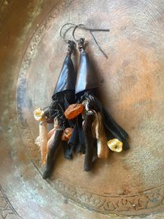 WITCH EARRINGS / Copper Rustic Earrings / Handmade / One of A Kind / Copper Jewelry I designed with genuine black leather and Copper The measured is from top to the end 9cm I have oxidized with liver of sulphure. I will send you nice gift box ,eco-friendly packet and Registered AirMail. Many thanks for visit my store.🧚🧚 Handmade Vintage Halloween Earrings, Vintage Handmade Halloween Earrings, Artisan Dangle Earrings For Party, Witchy Black Earrings For Festival, Black Witchy Earrings For Festival, Handmade Bohemian Earrings For Halloween, Unique Orange Earrings For Festival, Handmade Witchy Dangle Earrings, Witchy Dangle Earrings For Festival