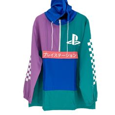 Title: Playstation Bioworld Pastel Colorblock Checkered Long Sleeve Hooded Windbreaker Brand: Sony Playstation Description: Get Ready And Press Play On This Playstation Bioworld Windbreaker For Gaming Meets Streetwear Apparel. The Sony Playstation Bioworld Windbreaker Has An Attached, Blue Hood With White Drawstring Closure, Partial Zip Front Closure, Oversized Front Zipped Pocket With Colorblock Purple And Green Sleeves. The Checkerboard Pattern Is Printed On The Side Of Each Sleeve. The Playst Hooded Patchwork Track Jacket For Streetwear, Blue Hooded Outerwear With Contrast Color, Purple Patchwork Outerwear For Streetwear, Multicolor Hooded Windbreaker For Streetwear, Multicolor Hooded Windbreaker With Color Block, Hooded Multicolor Windbreaker For Streetwear, Multicolor Hooded Color Block Windbreaker, Purple Hoodie With Pockets For Streetwear, Purple Hooded Hoodie With Pockets