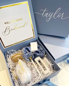 "Calling all brides!! This is the perfect gift boxes for your lovely bridesmaids and maid of honour. These proposal boxes are sure to bring a smile to your wedding party and expect them to say the easiest \"yes\"! :)  Available for:Bridesmaid, maid of honor and maid of honour. This listing is for 1 gift box contents included! -1 9.5x9.5x4 inch sturdy folding gift box with the phrase, \"Will you be my Bridesmaid/Maid of honor?\" inside the lid and name/inital outside the lid in premium vinyl. -1 personalized glass (personalization is made with premium vinyl and should be hand washed only) -diamond pen -1 satin XL scrunchie - 1 hair claw **Please note: Fonts on glasses will now be the same font chosen for the boxes** If more than 2 boxes is ordered, boxes may come disassemble for economic sh Royal Wedding Themes, Bridal Gift Box, Proposal Boxes, Box Bridesmaid, Dream Beach Wedding, Bridesmaid Ideas, Dusty Blue Wedding, Bridesmaid Boxes, Gifts Bridesmaid