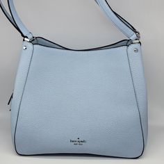 Brand: Kate Spade Style: Leila Medium Triple Compartment Shoulder Bag Condition: New With Tag Exterior Color: Ocean Fog Interior Features: Center Zipper Compartment; Inside Zip And Multifunction Pockets Closure: Magnetic Snap; Zipper Hardware Color: Silver Straps: Two Shoulder Straps Approx. Measurements: 10.5" L Across Top (Or 12" Across Bottom) X 10.5" H X 5" W No Lowball Offers Or Trades Please. Thank You For Looking! Dinosaur Purse, Kate Spade Designer, Kate Spade Disney, Kate Spade Style, Kate Spade Shoulder Bag, Brown Purses, Large Handbags, Kate Spade Purse, Mini Shoulder Bag