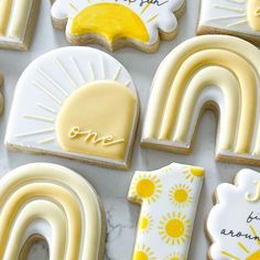 decorated cookies are arranged on a table