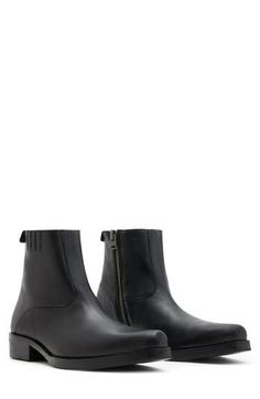 A modern blend of Western and Chelsea silhouettes, this short boot goes a long way in its wardrobe- and season-spanning capabilities. Side zip closure Leather upper and lining/rubber sole Made in Portugal Allsaints Leather Ankle Boots, Black Leather Waterproof Boots Fade-resistant, Luxury Semi-formal Men's Chelsea Boots, Side Zip, All Saints, Short Boots, Boots Men, Chelsea, Leather Upper