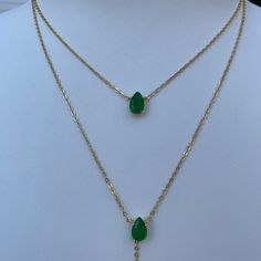 We are so in love with this emerald lariat necklace set.. This is a 2 in 1 necklace attached together Featuring simulated emeralds set on a silver gold plated chain measuring 16-18 inches in the length around the neck Sku GAN0315 Adjustable Green Lariat Necklace, Elegant Adjustable Emerald Gemstone Necklace, Elegant Adjustable Green Lariat Necklace, Emerald Jewelry With Adjustable Green Chain, Green Emerald Jewelry With Adjustable Chain, Green Emerald Jewelry With Delicate Chain, Dainty Emerald Jewelry With Adjustable Chain, Green Lariat Jewelry For Formal Occasions, Formal Green Lariat Jewelry