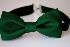 Green bow tie emerald green bow tie mens bow tie boys bow | Etsy Classic Green Bow Tie For Formal Occasions, Adjustable Green Bow Tie For Formal Occasions, Classic Green Bow Tie For Gifts, Classic Adjustable Green Bow Tie, Classic Green Bow, Classic Green Bow Tie For Party, Classic Green Bow Tie With Satin Bow, Classic Green Bow With Bow Tie Back, Elegant Green Bow Tie