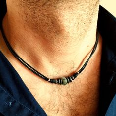 Surf style choker necklace for men with natural gray labradorite and black hematite stone beads on black cotton cord, stainless steel lobster clasp closure. A simple everyday necklace for men with natural stones will be a nice gift for him. Cotton cord choker necklace will be a great option for creating a casual look. labradorite stone bead aprox:  10-12 mm For all products are used only genuine high-quality Italian leather, natural stones and wood. All metal materials are lead and nickel free. Beaded Necklaces For Men, Minimalist Hematite Round Bead Jewelry, Spiritual Jewelry With Natural Stones On Waxed Cord, Spiritual Jewelry With Natural Stones And Waxed Cord, Hand Wrapped Black Jewelry With Waxed Cord, Minimalist Adjustable Hand Wrapped Necklaces, Black Minimalist Jewelry With Adjustable Cord, Adjustable Hematite Necklace For Gift, Minimalist Jewelry With Adjustable Waxed Cord