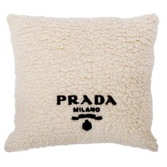 a pillow with the words prada on it