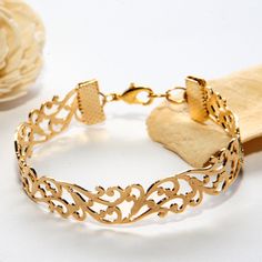 This charming Filigree Bracelet is plated with rose gold (as shown in pictures). Also available in silver or gold plating.  A modern twist on a traditional Moroccan design. This lace filigree bracelet will make a special statement anywhere you wear it! Perfect for casual and dress use.  A fabulous option for bridal jewelry as well! MEASUREMENTS ❀ Filigree cuff bracelet size is 16cm.  ❀ Comes with extra links for individual size adjustment. This beautiful bracelet can be adjusted to fit nearly any size - please include desired length in the 'message to seller' box at checkout. ---------------------------------------------------------- -- Available in silver-plated and rose gold finishes as well -- If you would like to see more pics of the silver-plated version, you can view them here: www.e Gold Filigree Bracelet, Antique Gold Bracelet, 22k Gold Bangles, Design Marocain, Arm Cuff Bracelet, Filigree Ring Gold, Filigree Bracelet, Lace Bracelet, Bracelet Rose Gold