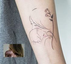 a woman's arm with a small tattoo on the left side of her arm