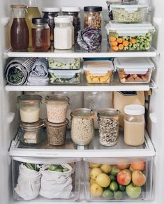 an open refrigerator filled with lots of food