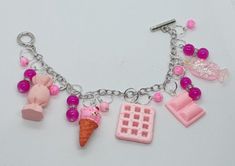 This bracelet is so stinking adorable! Made with  resin charms, and silver tone materials. Can be made longer if needed. Be sure to check out my other items too.  I have amazing deals in my CLEARANCE sections. Check them out! Pink Sweets, Fun Jewelry, Resin Charms, Pink Princess, Key Chains, Pretty Pink, Charm Bracelets, Costume Design, Amazing Jewelry