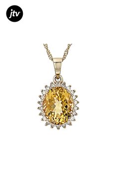 1.90ct Oval Yellow Beryl With 0.18ctw Round White Diamond 14k Yellow Gold Pendant With 18" Singapore Chain. Measures Approximately 0.75"L x 0.45"W. Lobster Claw Clasp. Yellow Gold Diamond Necklace With Center Stone, Diamond Necklace With Center Stone In Yellow Gold, Pendant With Chain, Yellow Gold Pendants, White Diamond, Lobster Claw, Gold Pendant, Singapore, Yellow Gold