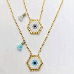 "Beautiful Evil Eye Necklace-POSITIVE  ENERGY Charm-It is dainty and delicate.Perfect Christmas gift for your loved ones.  🧿 Available in blue and grey evil eye charm. Necklaces are made with 18 kt gold plated chain. 🎄Adjustable * Delicate package * Light Weight * High Quality. 🎄 All byMARR necklaces are made with 18 kt gold plated chain. Please, follow care instructions. Click + fast shipping + delicate package + discount on your next purchase. ❤️Item details:❤️ Necklaces:  14\" ( 36 cm) Nec Dainty Beaded Necklace With Pendant For Gift, Adjustable Charm Necklaces With Tiny Beads As Gift, Dangle Beaded Necklaces With Tiny Beads For Gifts, Adjustable Tiny Beads Charm Necklace As Gift, Gift Pendant Necklace With Tiny Beads, Dainty Charm Necklaces With Tiny Beads For Gift, Dainty Beaded Charm Necklaces As Gift, Dainty Beaded Charm Necklace For Gift, Pendant Beaded Necklace With Delicate Chain For Gift