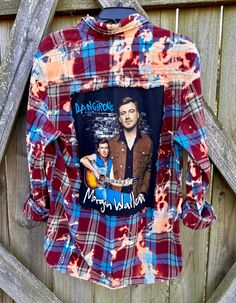 A Morgan Wallen bleached, distressed, one of a kind, long sleeve, size LARGE flannel shirt. This is perfect for the Morgan Wallen fan. There are two pockets on the front, buttons up and is long sleeve. On the back of the shirt is a MORGAN WALLEN concert tee that has been sewn into the back of the flannel. The flannel is frayed around the tee giving the flannela over all distressed/vintage/tattered look.  Upcycled/Distressed Long Sleeve Size Large 100% Cotton Button Up All my shirts are a ONE OF A KIND. They are all upcycled and previously owned so there will be signs of wear and tear. But this is what make each one unique in its own way and for sure makes them the most comfortable.  Here are some ways you can style your shirt.  1) wear cowboy boots or tennis      shoes 2) wear it with jean Style Your Shirt, Morgan Wallen Concert, Distressed Long Sleeve, Morgan Wallen, Concert Tees, Plaid Flannel Shirt, Plaid Flannel, Tennis Shoes, Flannel Shirt