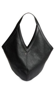 A sculptural shape subtly alludes to the 'M' in Mansur on a pebbled-leather shoulder bag detailed with a soft suede lining and slender tie closure. Tie closure Shoulder straps Suede lining Leather Made in Italy Designer Handbags Evening Hobo Bag In Textured Calf Leather, Evening Textured Calf Leather Hobo Bag, Chic Formal Hobo Bag With Leather Handles, Chic Pebbled Leather Shoulder Bag With Leather Lining, Modern Pebbled Leather Hobo Bag, Chic Textured Leather Hobo Bag, Chic Textured Calf Leather Hobo Bag, Chic Pebbled Leather Hobo Bag For Formal Occasions, Chic Structured Leather Hobo Bag