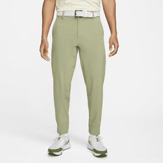 From the range to the course to your post-round plans, the Nike Tour joggers provide comfort you can take anywhere. A relaxed fit with a stretchy, sweat-wicking feel helps give you the confidence to swing your best. They're water-repellent too, so the rain is never a hazard. Equipped with pockets all around for your tees, scorecard and glove, stay prepared when you're next up on the box. Nike Athleisure Joggers For Outdoor, Nike Functional Bottoms With 4-way Stretch, Nike Functional 4-way Stretch Bottoms, Nike Functional Cargo Pants For Sports, Nike Green Bottoms For Outdoor Activities, Nike Green Bottoms For Outdoor, Nike Sportswear Pants For Outdoor Activities, Functional Moisture-wicking Bottoms For Golf, Moisture-wicking Athleisure Bottoms For Golf