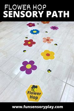 flowers on the floor with text overlay reading flower hop sensory path